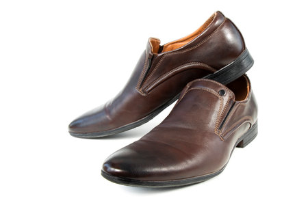 men's classic shoes, brown, on a white isolated backgroundの写真素材