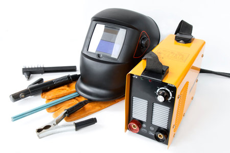 Inverter welding machine and mask, Electro welding equipment on a white backgroundの写真素材