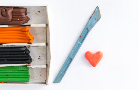 Homemade plasticine, play dough on a white background. Molding clay or slime. homemade clay.の写真素材