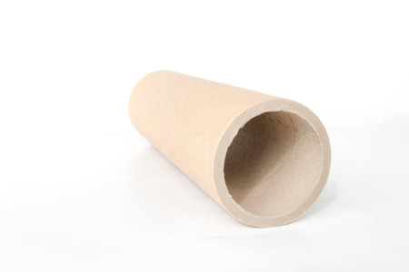 Pressed paper cylindrical tube, on an isolated white backgroundの写真素材
