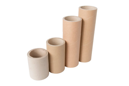 Pressed paper cylindrical tubes, on an isolated white backgroundの写真素材