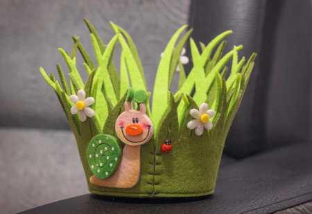 children's headdress made of fabric in the form of grass and flowersの写真素材