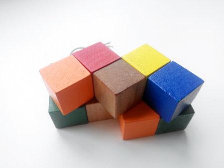 Puzzle, Colorful Wooden toy blocks, on white background. Eco friendly materials