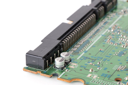 Green printed fax motherboard with microcircuit, close-upの写真素材