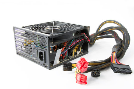 disassembled Computer Power Supply Unit, on a white isolated backgroundの写真素材