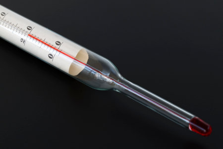 glass, technical mercury thermometer, 20 degrees Celsius, on a gray backgroundの写真素材