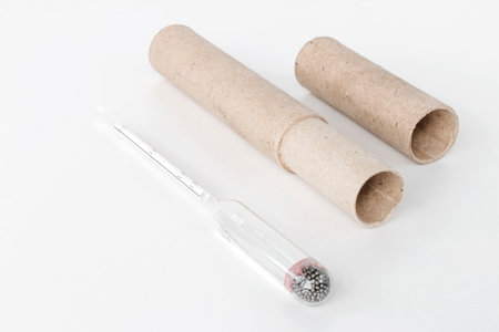 hydrometer, a tool for measuring the density of the battery electrolyte, on a white backgroundの写真素材