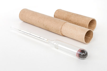 hydrometer, a tool for measuring the density of the battery electrolyte, on a black backgroundの写真素材