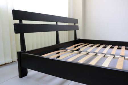 frame of a double wooden bedの写真素材