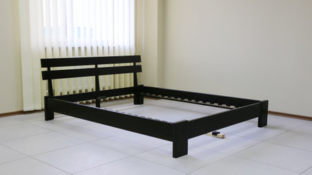 assembly process of a double wooden bed with orthopedic slatsの写真素材
