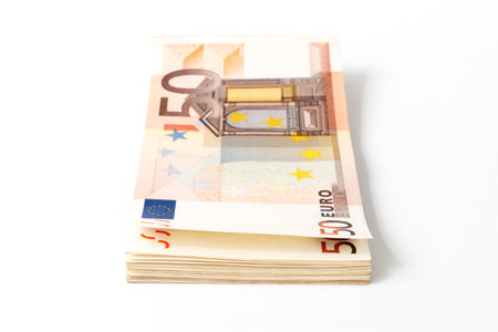 stack of paper money with 50 euro banknote