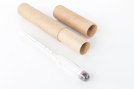 hydrometer, a tool for measuring the density of the battery electrolyte, on a white backgroundの写真素材