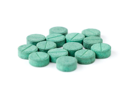 Pills, medicines and supplements, pharmaceutical industry concept, selective focus on isolated white backgroundの写真素材