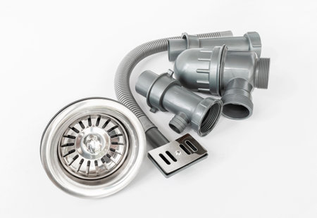 New plastic kitchen siphon isolated on white backgroundの写真素材