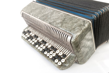 vintage musical accordion, on an isolated white backgroundの写真素材