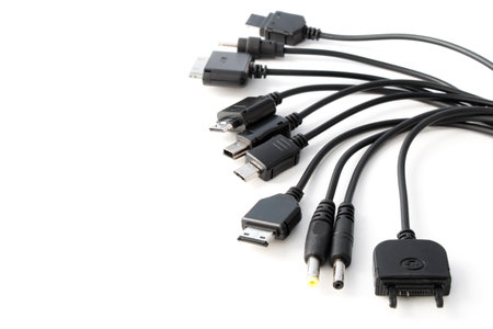 different types of charger connectors for phones, on a white backgroundの写真素材
