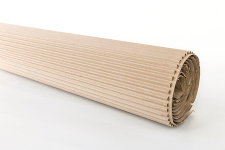 corrugated cardboard rolled up isolated on white background close viewの写真素材