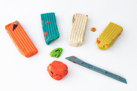Homemade plasticine, play dough on a white background. Molding clay or slime. homemade clay.の写真素材