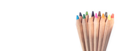 multi-colored pencils lie on a white background, close-upの写真素材