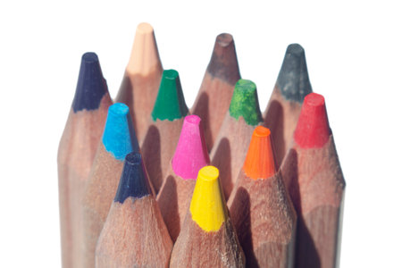 multi-colored pencils lie on a white background, close-upの写真素材