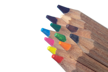 multi-colored pencils lie on a white background, close-upの写真素材
