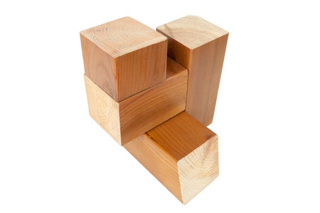 geometric figure made of trimmed lacquered wooden bars on an isolated white background,の写真素材