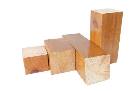 geometric figure made of trimmed lacquered wooden bars on an isolated white background,の写真素材