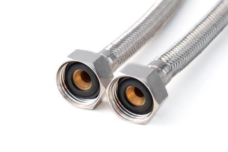 stainless steel water hose on white backgroundの写真素材