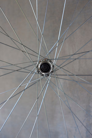 bicycle aluminum rim element with spokes and bushingの写真素材