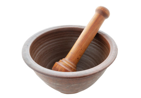 clay mortar and wooden pestle, isolated backgroundの写真素材