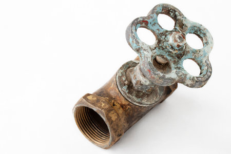 old screw tap for water, on a white backgroundの写真素材