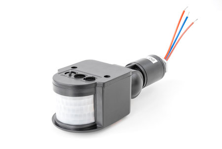 outdoor motion sensor, detector for home security or lighting system, on isolated whiteの写真素材