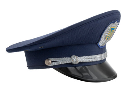 peaked cap of a policeman of Ukraine, a trident on a cockade, cut out on an isolated backgroundの写真素材