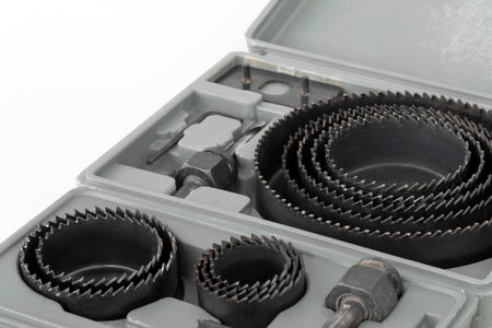 A set of Hole saws in different sizes for cutting holes in wood and drywallの写真素材