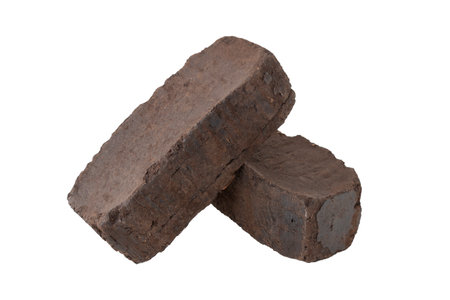 peat fuel briquettes for use on open fires, an alternative type of fuel for heating. Close-up, cut outの写真素材
