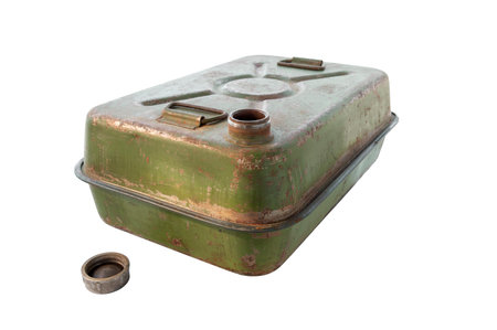 open old rusty gasoline can isolated on whiteの写真素材
