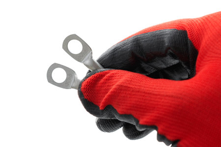 Crimp terminal ring for heavy electric cable in hand, cut outの写真素材
