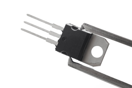 Plastic transistor, voltage regulator encapsulated TO220, isolated on white backgroundの写真素材