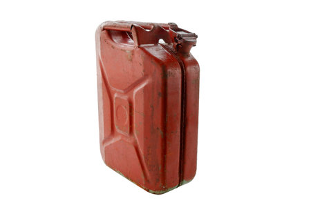 Old red metal gasoline canister, isolated, clipping pathの写真素材