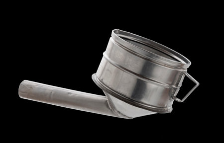 a metal funnel for gasoline or diesel fuel, isolated, cut outの写真素材