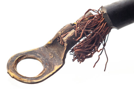 damaged car cable with ring terminal, on isolated whiteの写真素材