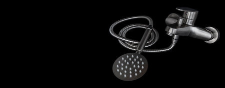 Shower faucet, bathroom mixer cold hot water faucet, Shower pipe and shower head, material - stainless steel, on isolated black background with copy space.の写真素材