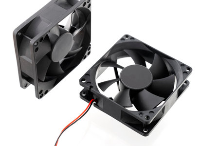 Two vector computer fans on isolated white background, close-up.の写真素材