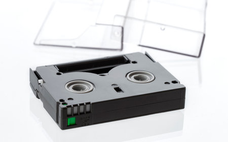 Videocassette standard miniDV, 8mm cassette for video cameras, isolated on a white background.の写真素材