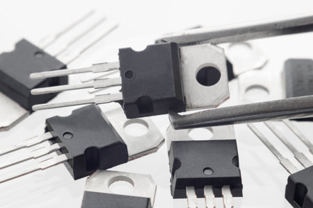 Plastic transistor, voltage regulator encapsulated TO220, isolated on white backgroundの写真素材