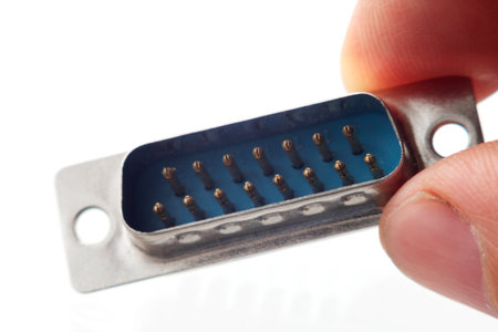 Hand holding a monitor plug VGA. male connectorの写真素材