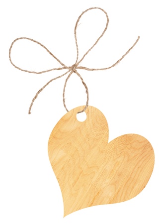 Wooden heart on a rope with a bowの写真素材