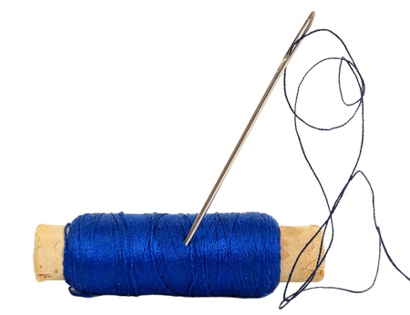 Spool of thread with needle