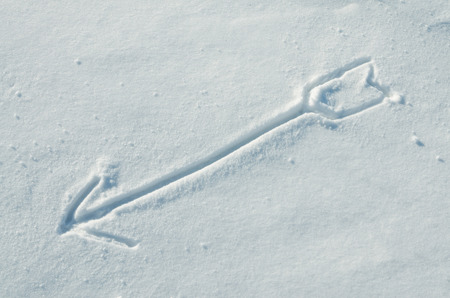 Arrow drawn on a snow
