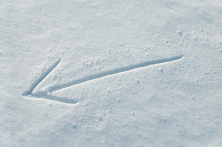 Arrow drawn on a snow